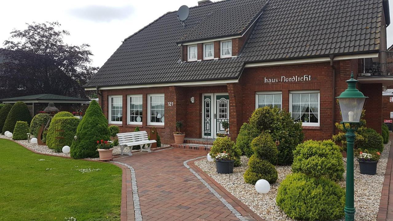 Hausnordlicht Fewo 1 Dornum Buitenkant foto